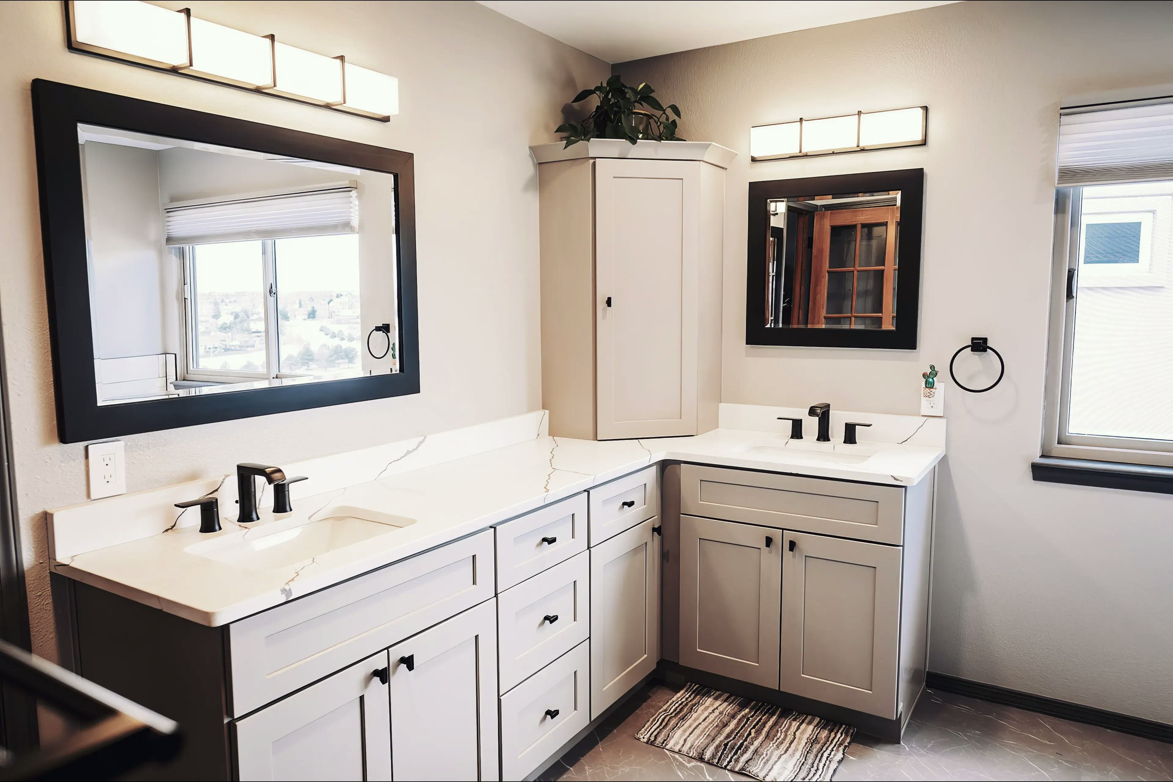 A bathroom walk-in shower remodel in Colorado Springs with a white stone counter top and a built in medicine cabinet