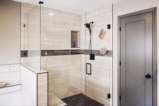 A bathroom walk-in shower remodel in Colorado Springs with modern frameless glass