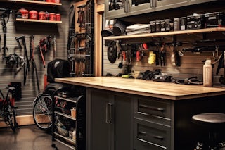 A photograph of a garage that was just remodeled workbench with tools 