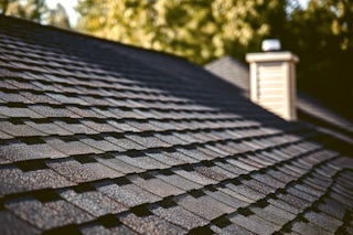 A photograph of an asphalt shingled roof repaired and installed by Homefix in Colorado Springs