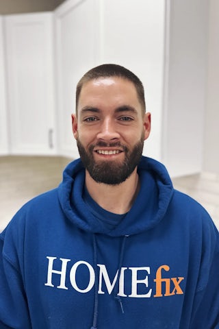 A photograph of Ian, a champion at Homefix in Colorado Springs
