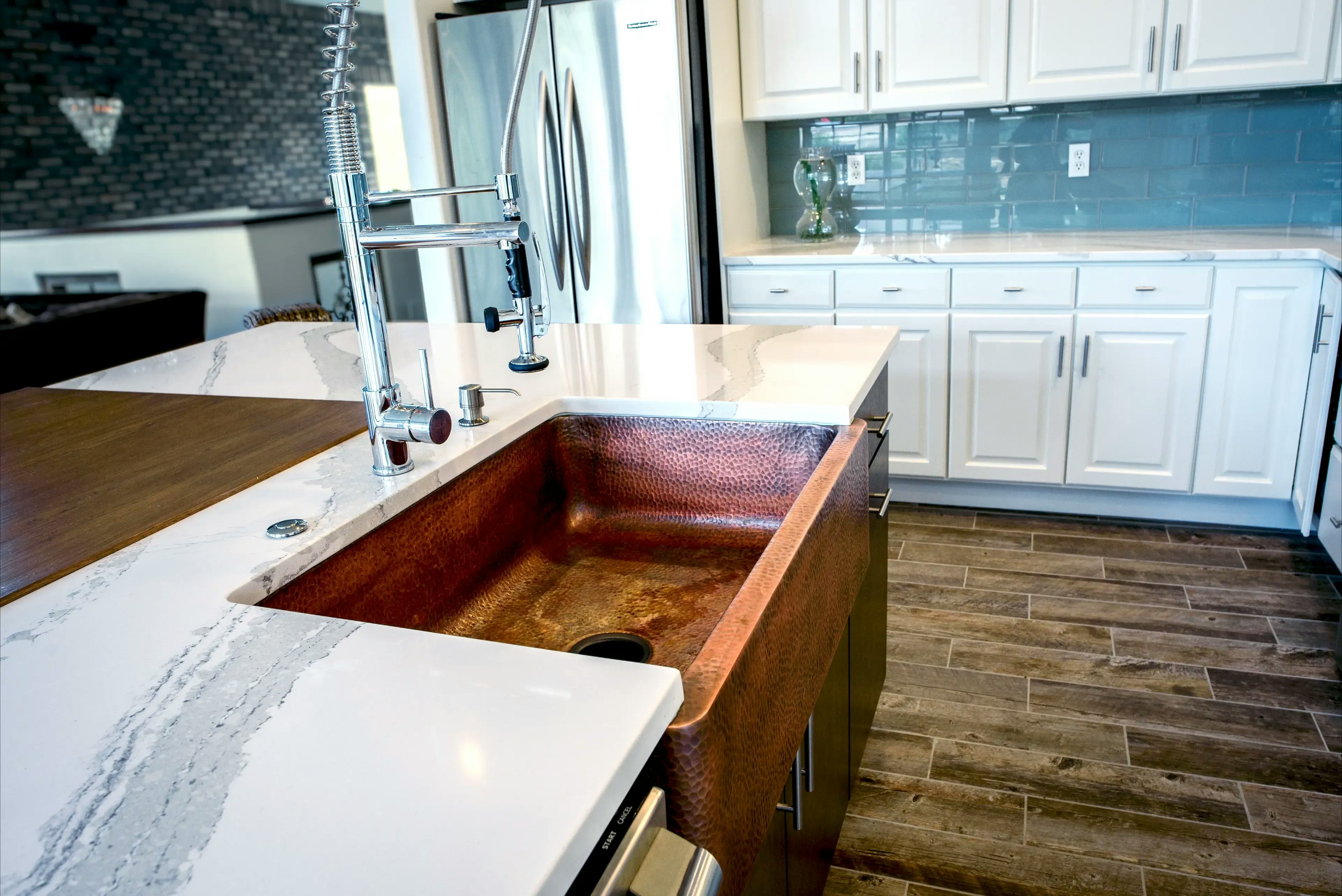 A hammered copper sink installed in a new kitchen remodel located in Colorado Springs